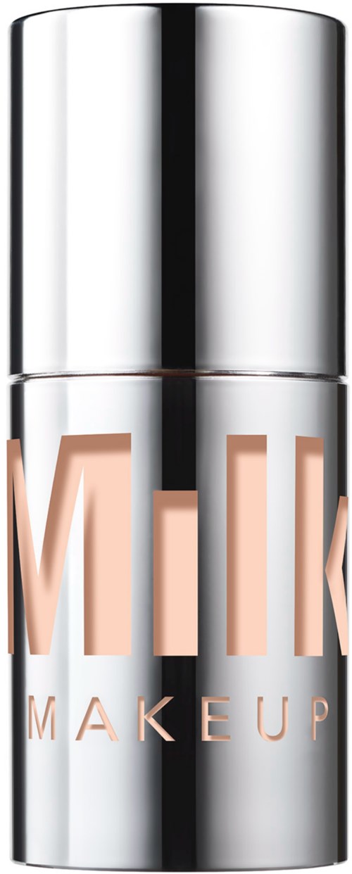 A silver cylindrical makeup product with the word "MILK" in large letters and "MAKEUP" below it.