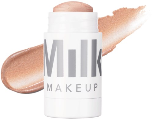 Een witte make-upstift met het label "Milk" en beige kwasten op een witte achtergrond.