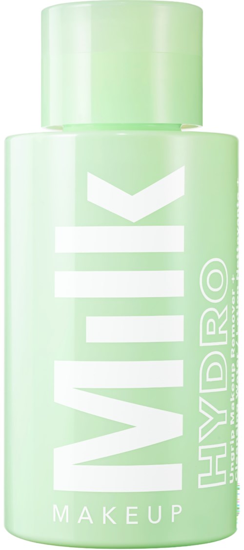Eine hellgrüne Flasche mit der Aufschrift 'MILK HYDRO' für Make-up oder Hautpflege. Das Design ist sauber und minimalistisch.