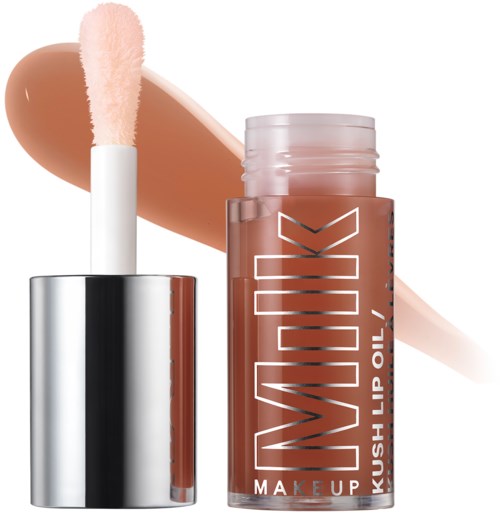 Lip gloss container with a wand and beige lip gloss smear. The container is branded with "KUSH" and "MAKEUP".