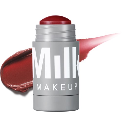 Lippenbalsemverpakking met rood getinte balsem en een streepje rode lippenstift erachter.