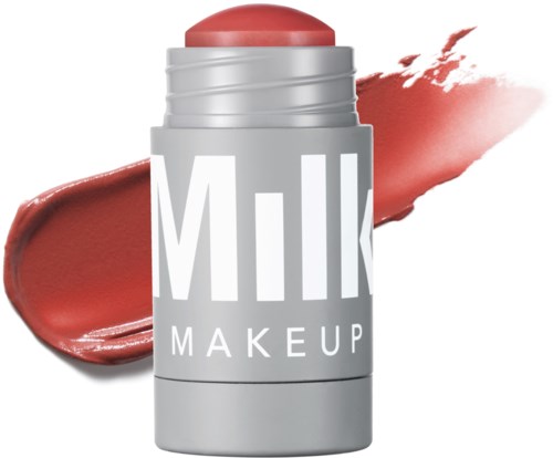 Een lippenbalsemcontainer met roze make-upstift en lippenstift erachter.