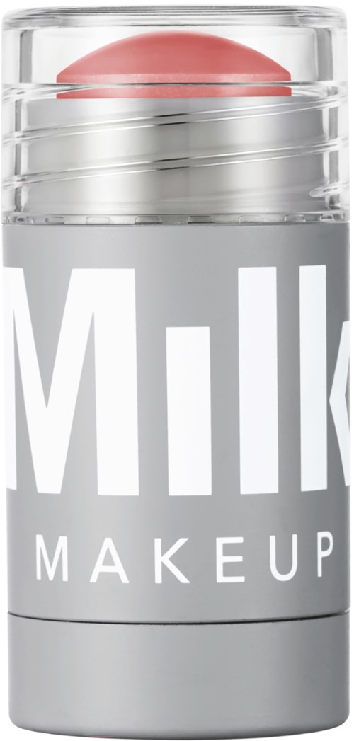 Een cosmetica container met een roze dop en de woorden 'MILK MAKEUP' op een grijze achtergrond.