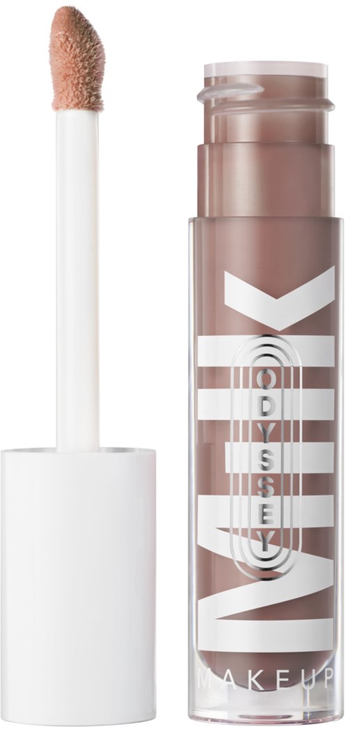 A beige lip gloss in a clear tube with white and silver markings, and a white applicator.
