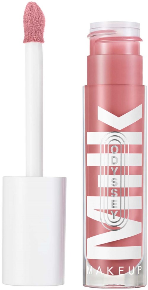 Lip gloss container with pink gloss and applicator brush. The word "WAKE" is on the packaging.