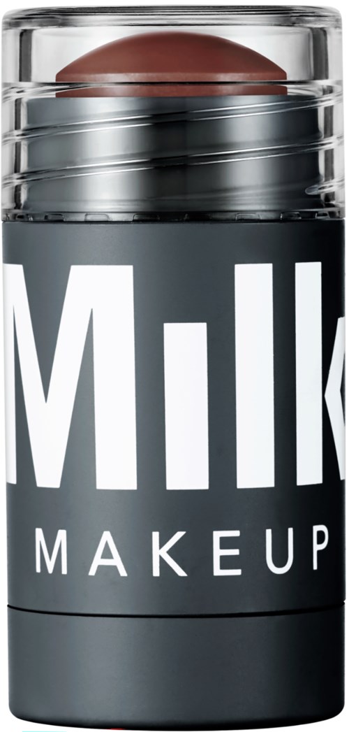 A container with a makeup sponge on top, labeled "Milk Makeup" on a dark background.