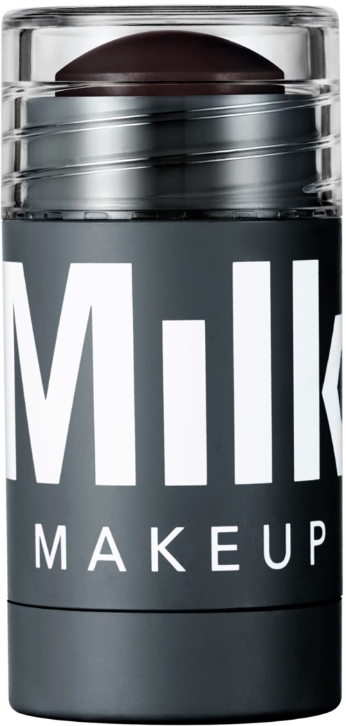Ein Make-up-Behälter mit einem schwarzen Applikator oben, beschriftet "Milk Makeup."