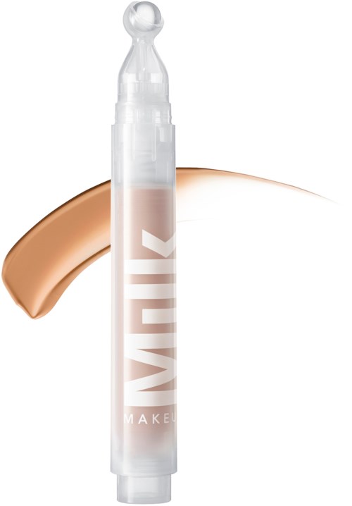 Eine klare Röhre mit rundem Abschluss, beschriftet mit 'MAKEUP,' mit einem braunen Make-up-Produkt dahinter.