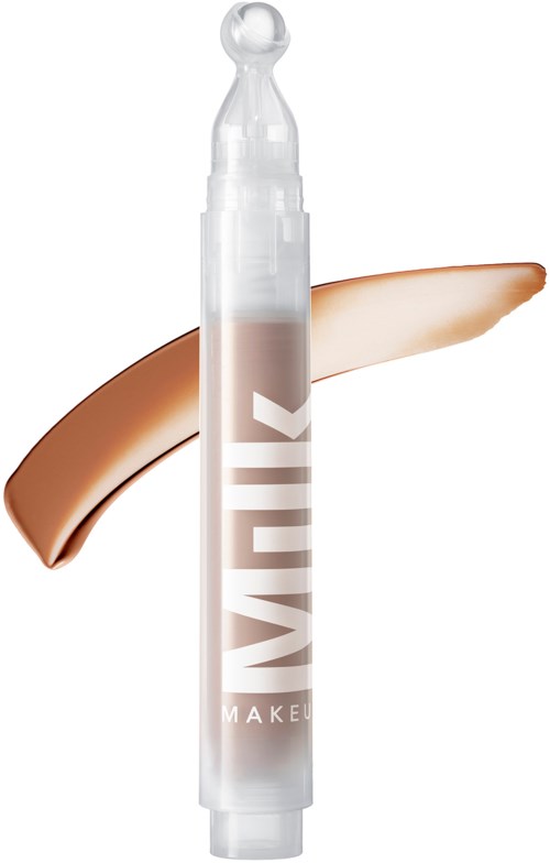 Een tube concealer met een beige streep op een witte achtergrond.