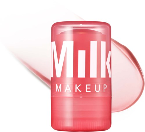 Rosa runde Verpackung mit 'Milk Makeup'-Aufdruck und einem Klecks rosa Creme daneben.