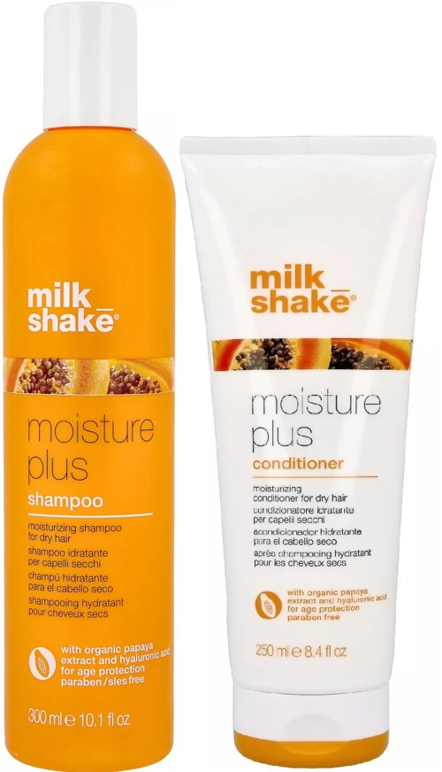Twee haarverzorgingsproducten: een shampoo in een oranje fles en een conditioner in een witte tube.