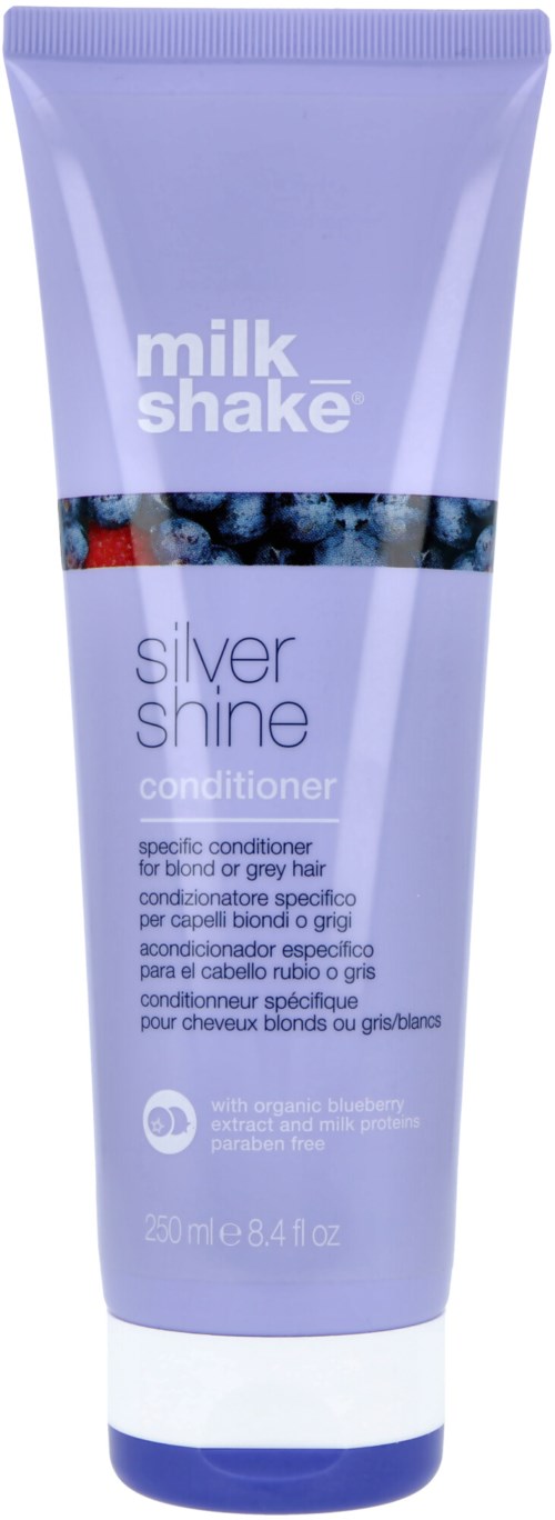 Een paarse tube Milk Shake Silver Shine conditioner voor blond of grijs haar. Bevat biologische blauwe lotusbloemen en melkproteïnen.