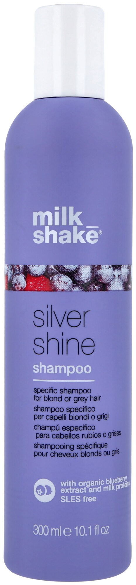 Een lange, paarse fles Milk Shake Silver Shine Shampoo met een witte dop, label met bessen en productinformatie.