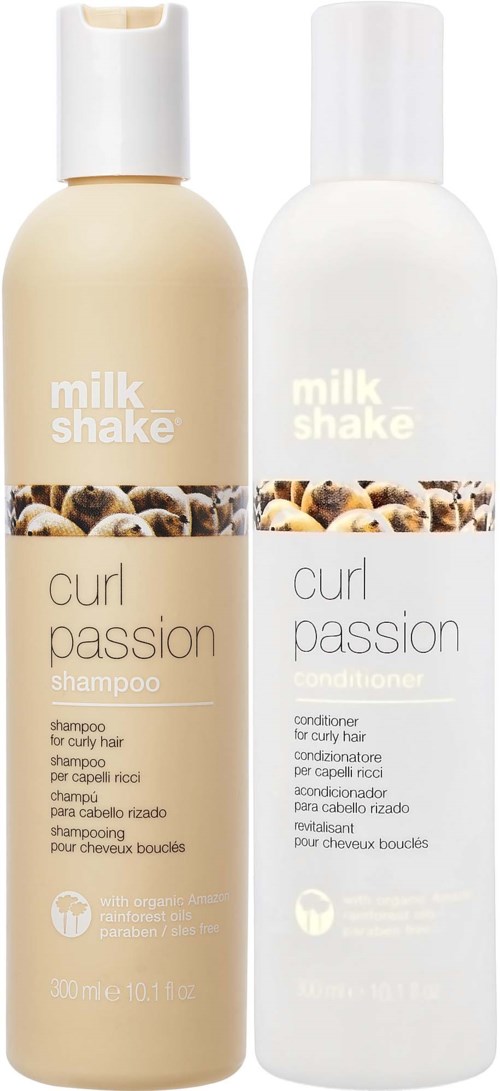 Zwei Flaschen mit 'milk shake' etikett, Shampoo und Conditioner für Locken, beige und weiße Verpackung.