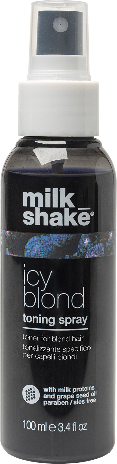 Een zwarte spuitfles met label 'milk shake icy blond toning spray' voor blond haar, met witte dop en spraymond.