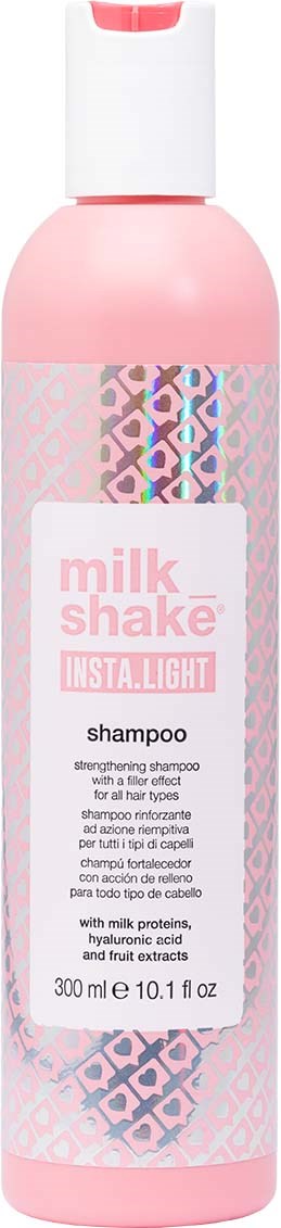 Pinke Shampoo-Flasche mit weißem Verschluss, beschriftet 'milk shake INSTA.LIGHT'.