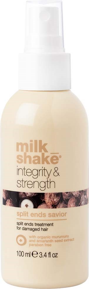 A hair treatment bottle labeled 'milk_shake' for damaged hair, with a pump and description of ingredients and size.