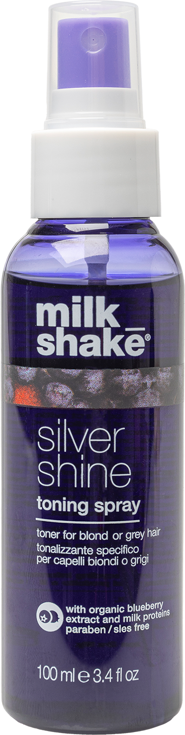 Een paarse sprayfles met 'milk shake silver shine' voor blond of grijs haar, met blauwe bessen extract en zonder parabenen.
