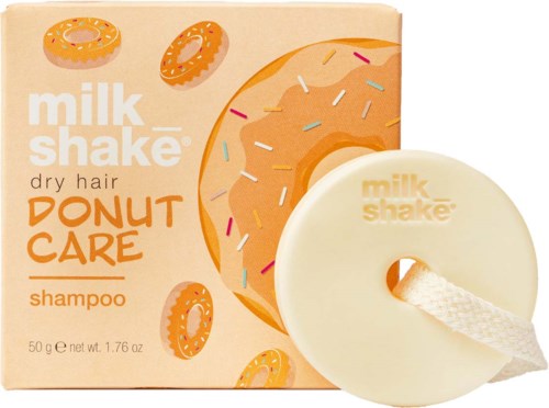 A soap with a donut shape and a rope, packaging shows a donut and cereal sprinkles on the label.