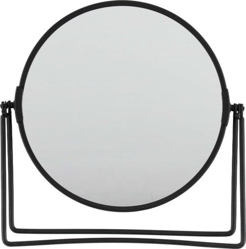 A round mirror with a black frame and stand, reflecting light or surroundings.