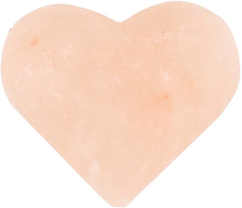 A heart-shaped, light pink object with a soft surface, possibly a piece of candy or a candy heart.