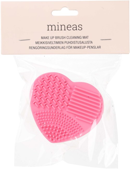 Roze siliconen make-up kwastreinigingsmat met getextureerde en geribbelde oppervlakken in een doorzichtige plastic zak.
