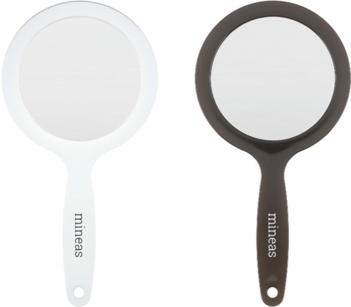 Two handheld mirrors, one white and one black, both with the brand name 'mineas' on the handles.