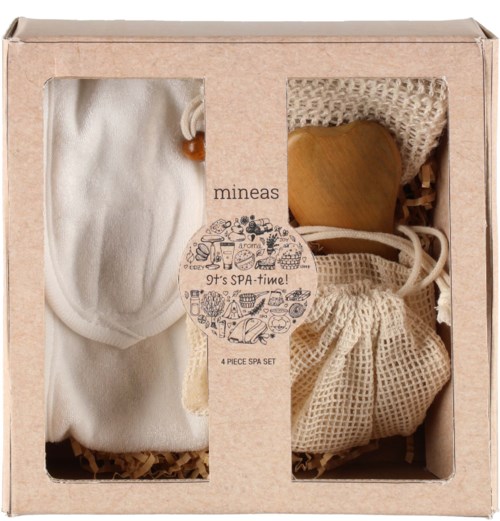 A spa gift set with a towel, wooden brush, and cloth bag for relaxation.