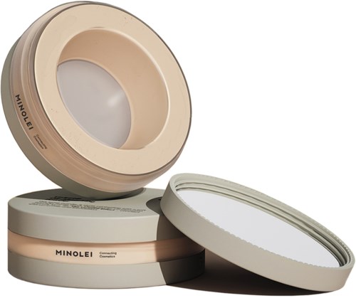Cirkulära behållare med genomskinliga fönster, beige och vita färger, och MINOLEI-märkning, troligen makeup- eller hudvårdsprodukter.