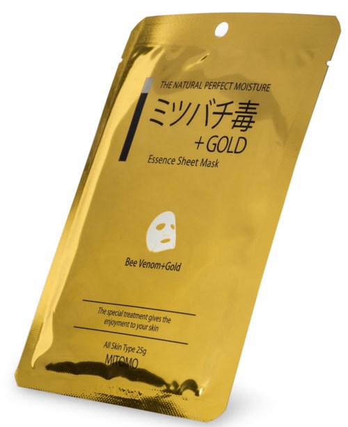 Goudkleurig maskerverpakking met Japanse tekst en bijgerelateerde merknaam.
