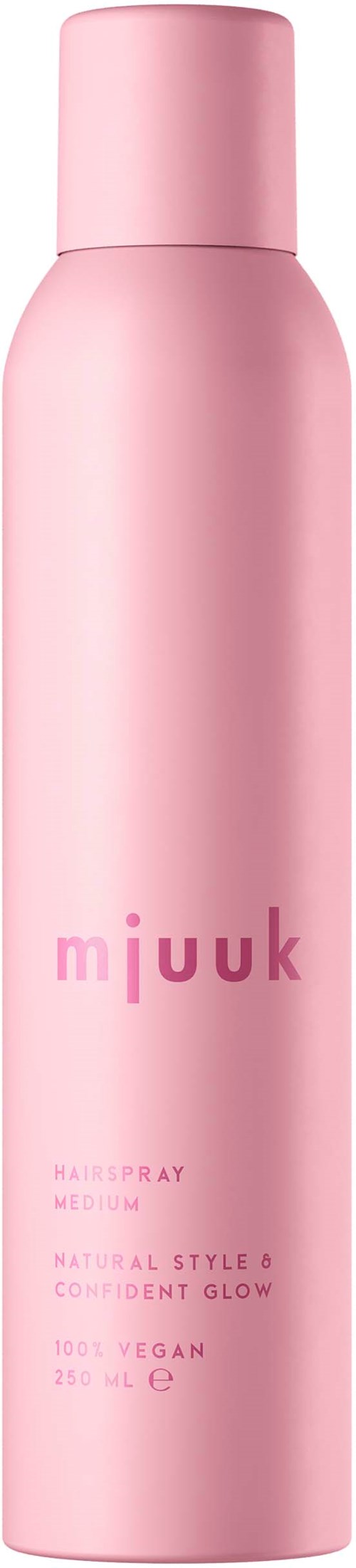 Een lange roze fles met de merknaam 'mjuuk'. Het is voor haarspray, medium hold, en veganistisch.