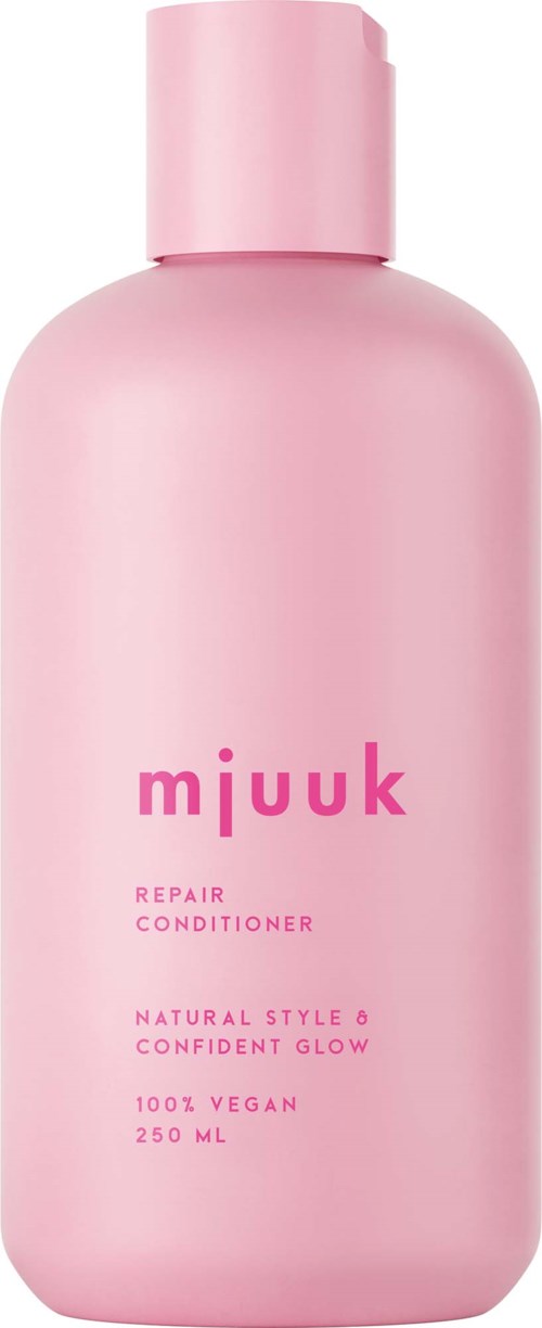Eine rosa Flasche mit Mjukt Aufkleber, Reparationsconditioner, vegan, 250 ml.