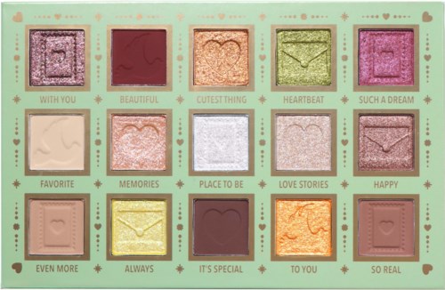 Makeup palette with 15 colorful eyeshadows, each labeled with a sweet phrase, surrounded by small hearts and stars.