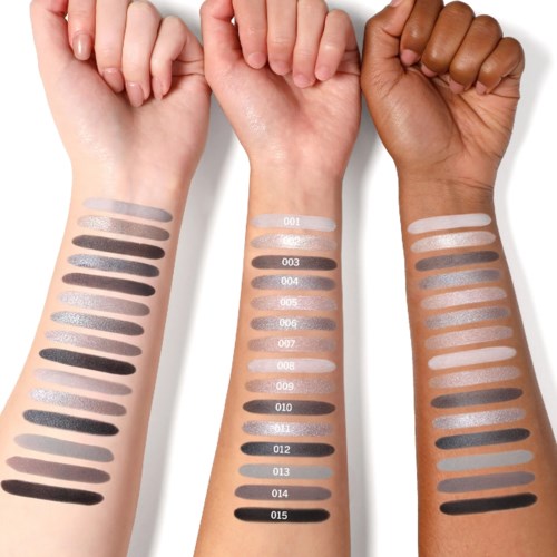 Three arms with different skin tones show various shades of makeup or eyeshadow swatches.