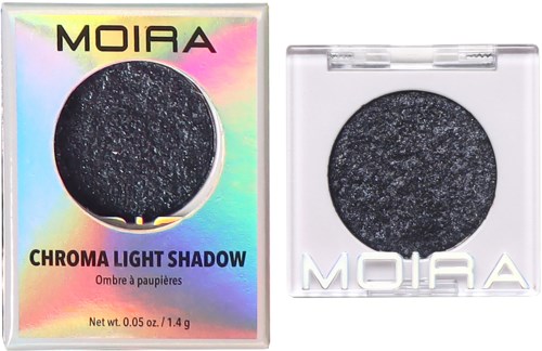 A black eyeshadow in holographic packaging. The packaging has the brand name 'MOIRA' and 'Chroma Light Shadow' written on it.