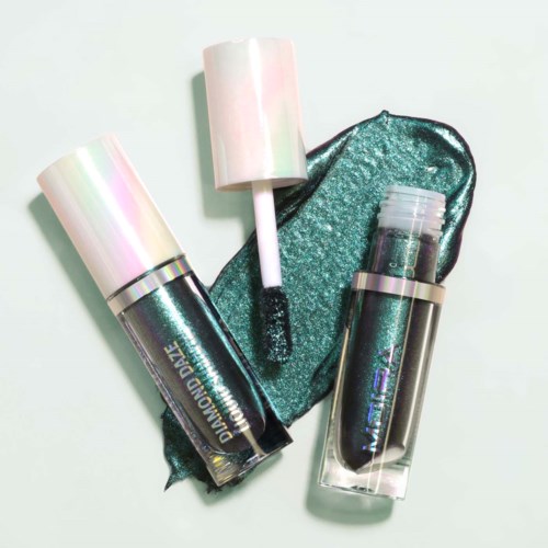 Two shimmering lip glosses and a lip gloss applicator with a teal shiny pouch.