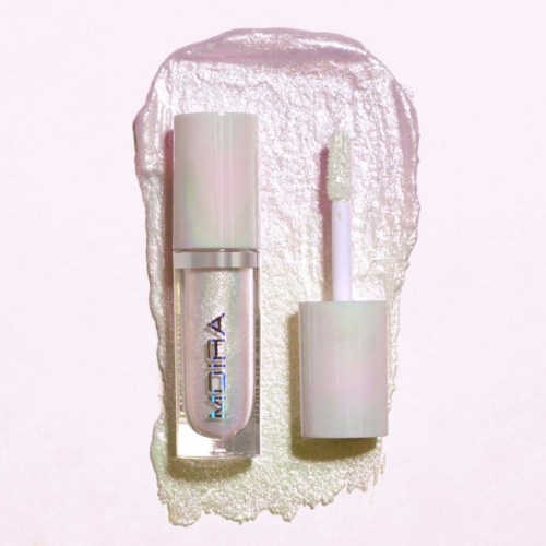 A nail polish bottle with iridescent colors and a separate applicator stick placed on a shiny, reflective surface.