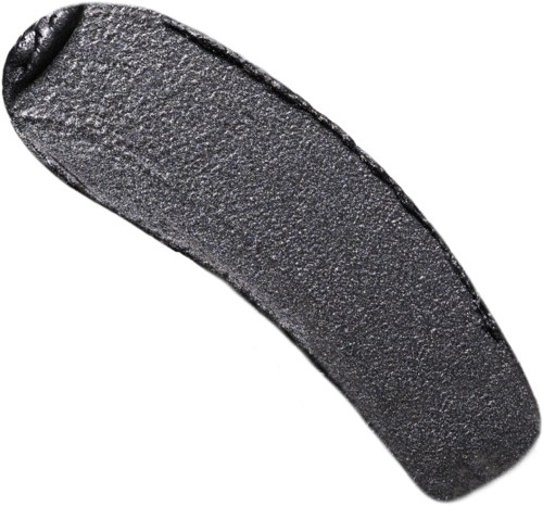 A dark, textured object with a curved shape, resembling a rock or a piece of rubber.