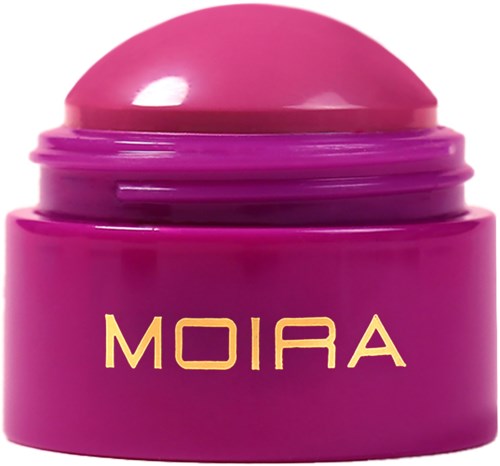 A pink container with a rounded lid, labeled 'MOIRA'. It looks like a cosmetic or skincare product.