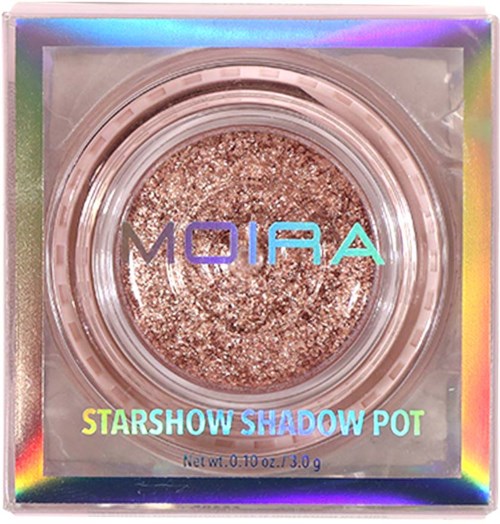A glittery eyeshadow in a round pot inside a colorful holographic box.