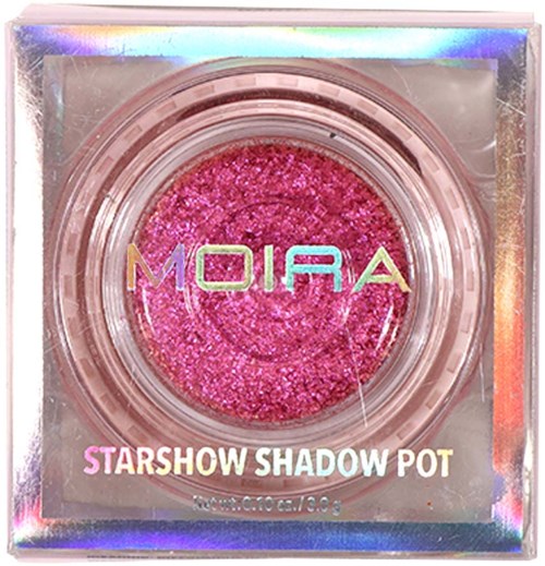 Pink glittery eyeshadow in a round container with holographic packaging, labeled 'MOIRA' and 'STARSHOW SHADOW POT.'