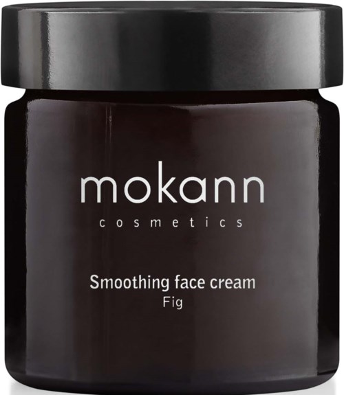 Ein schwarzer Behälter mit Deckel, beschriftet 'mokann cosmetics' und 'Smoothing face cream Fig'.