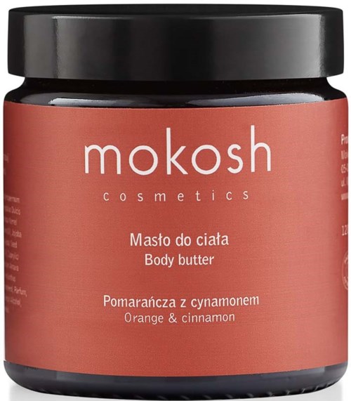 Purkin mekko, jossa punainen etiketti, musta kansi, nimeltä 'Mokosh cosmetics'. Se on appelsiini ja kaneli tuoksuinen.
