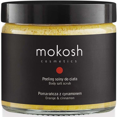 Een pot lichaamszoutscrub met sinaasappel en kaneel geur van Mokosh Cosmetics.