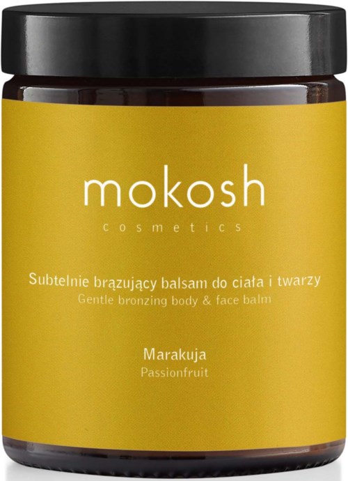 Een pot Mokosh cosmetica lichaams- en gezichtbalsem met passievrucht, gele label, zwarte deksel, eenvoudige tekst.