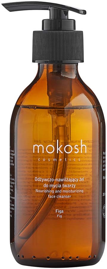 Een oranje-bruin fles met zwarte pomp, labeled 'mokosh cosmetics' en 'voedende gezichtsschoonmaker met vijg.'