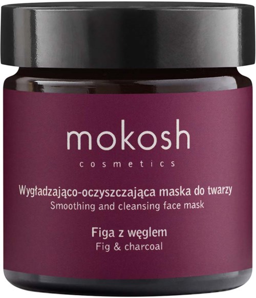 Een pot gezichtsmasker met 'mokosh cosmetics' label, paarse label, zwarte dop en tekst over gezichtsmasker met vijg en houtskool.