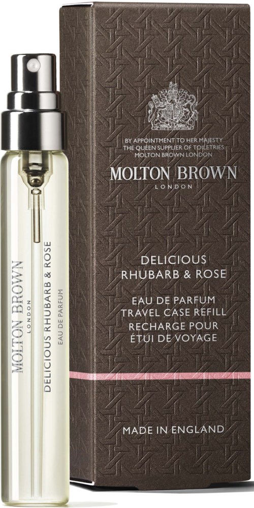 Kleine Sprühflasche und braune Box mit Text über Rhubarb & Rose Duft.