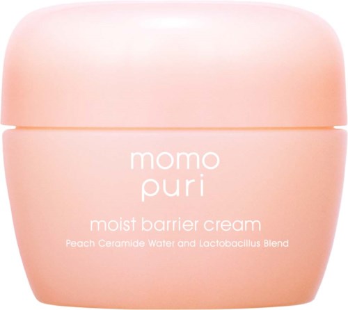 Een roze potje Momo Puri vochtbarrièrecrème met perzikkamidewater en lactobacillusblend.
