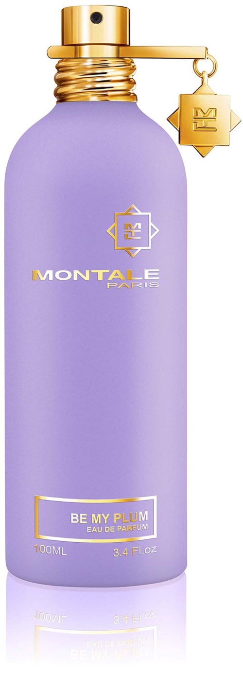 Een paarse parfumfles met een gouden deksel en ketting. Het label zegt Be My Plum en Montal Paris.
